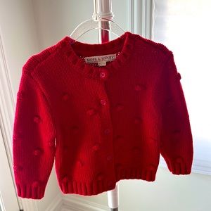 A red sweater for a little girl
